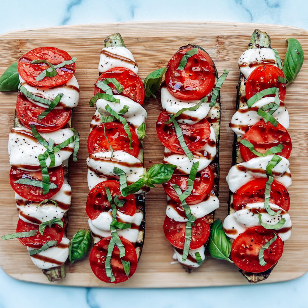 Grilled Caprese Zucchini Boats - Showit Blog